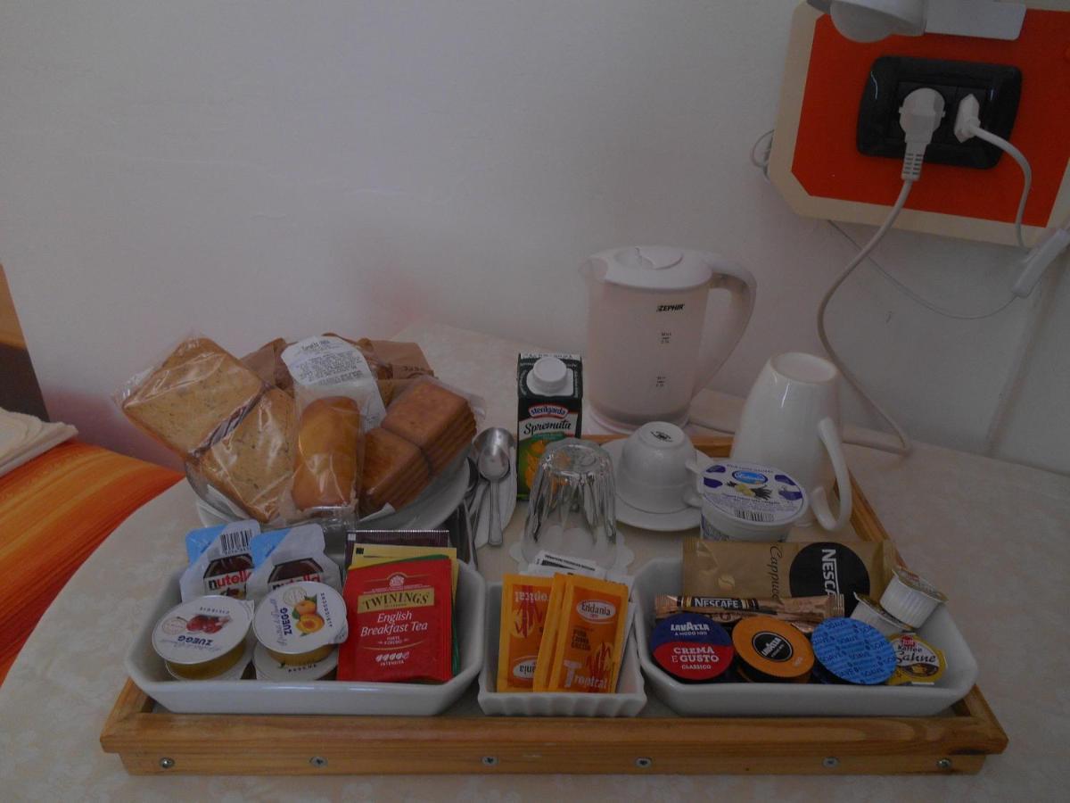 Le Rose Malpensa Bed & Breakfast บุสโตอาร์ซีซีโอ ภายนอก รูปภาพ